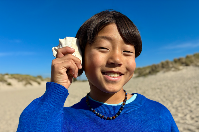 Foto hecha con la cámara Fusion de 48 Mpx, está en uso la función de retratos de última generación enfocada en la cara de una persona